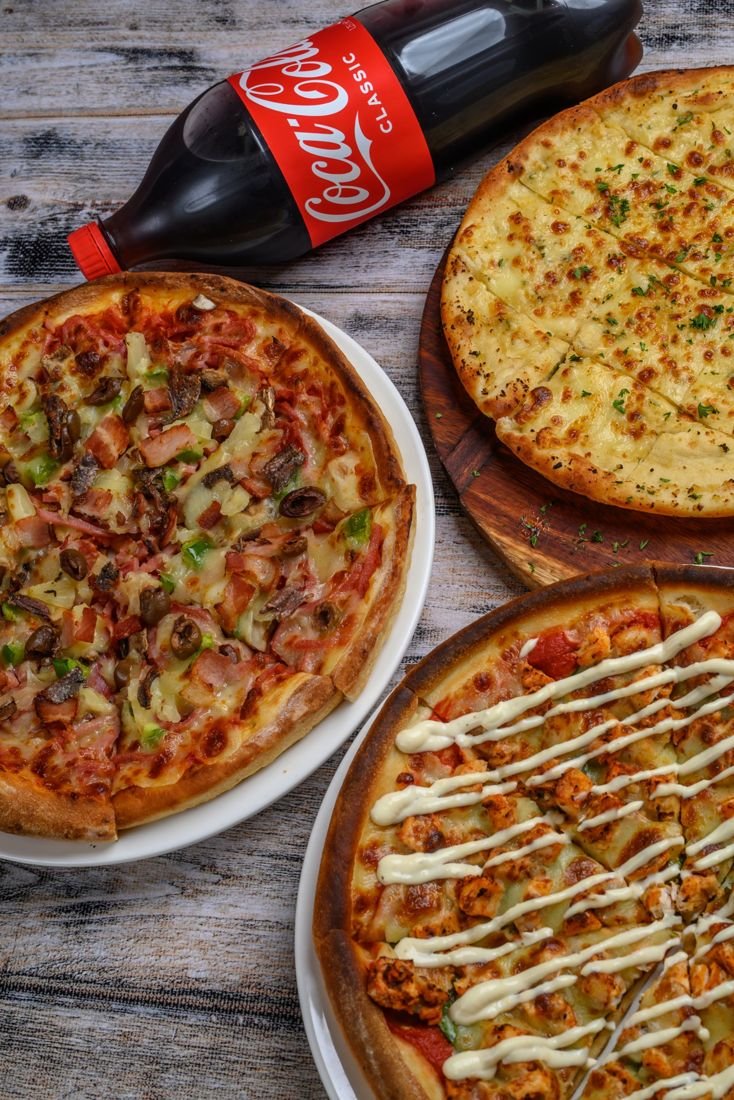 Supreme pizza, garlic bread and chicken pizza